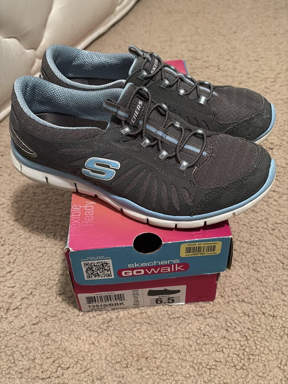 Skechers GOwalk Women's Black and Light Blue Slip-On Athletic Sneakers